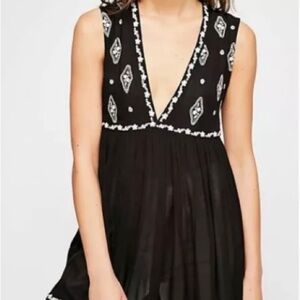 Black Sleeveless Top with White Pattern